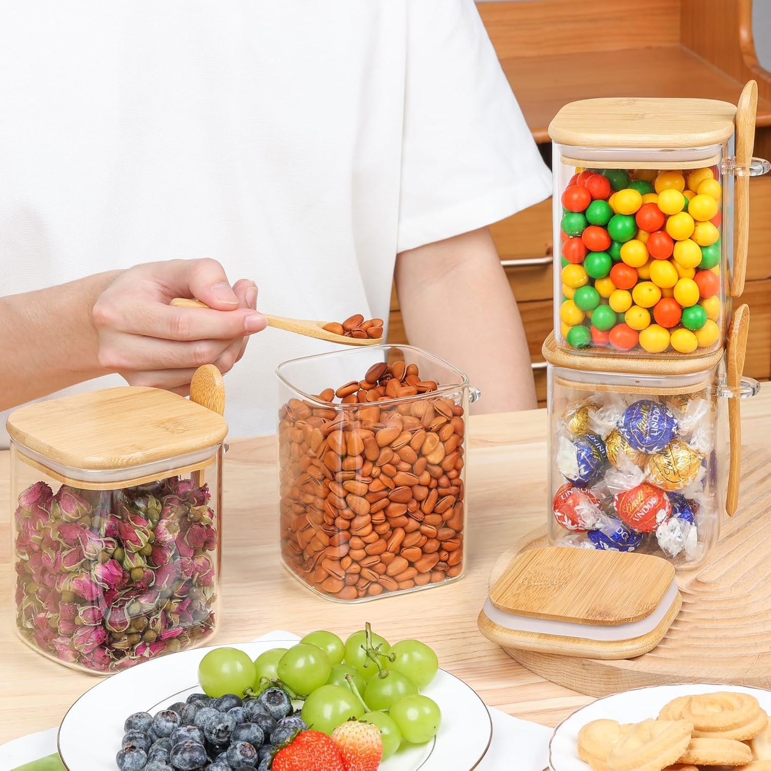 ComSaf clear glass jar for spices and snacks with visible contents.