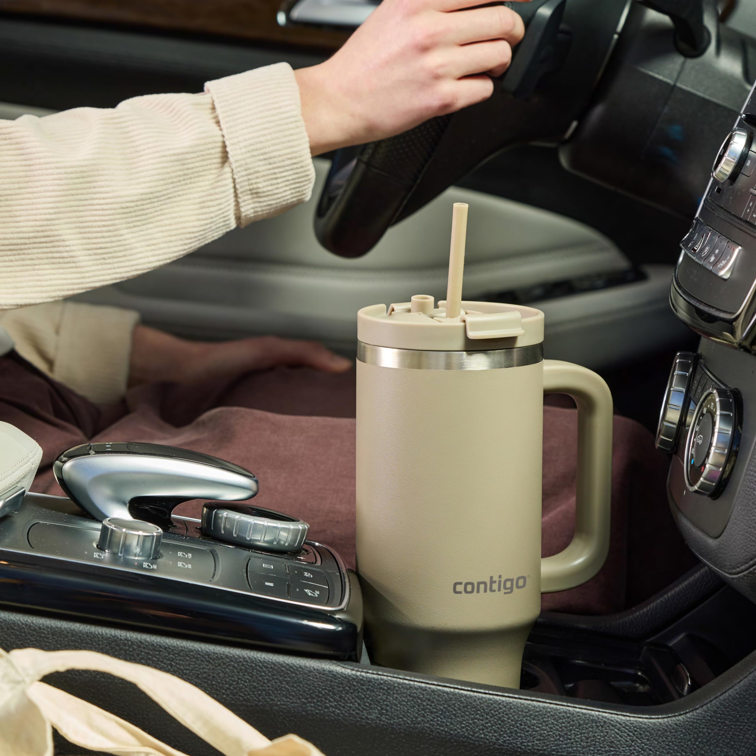 Contigo Streeterville 40oz tumbler fits most cupholders for travel.