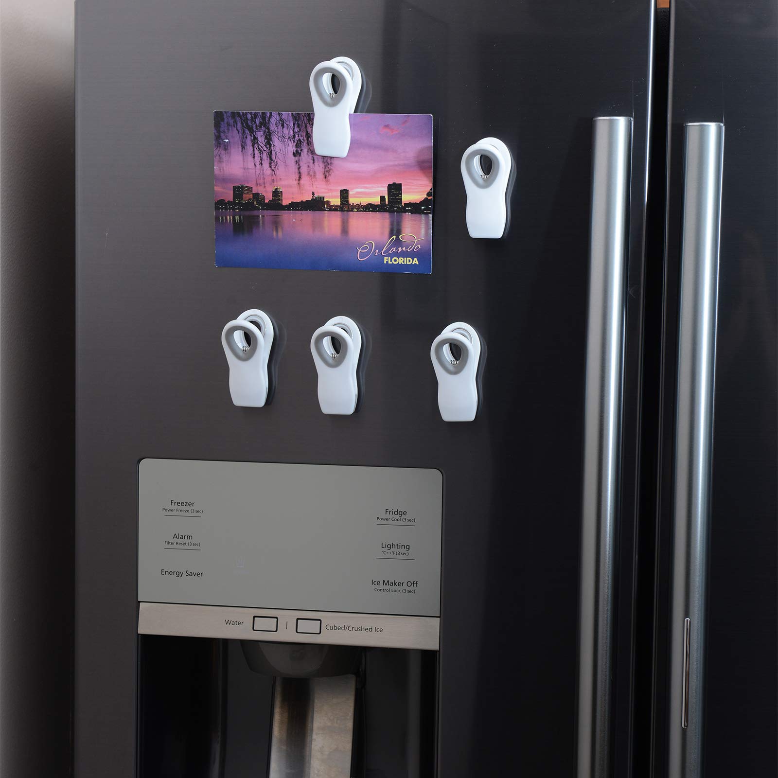 Cook with Color clips accommodate different bag sizes for versatile storage.