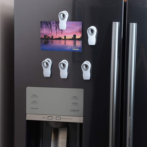 Cook with Color clips accommodate different bag sizes for versatile storage.