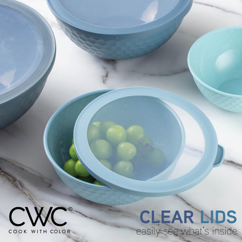 Embossed design on blue COOK WITH COLOR bowls for grip and stacking