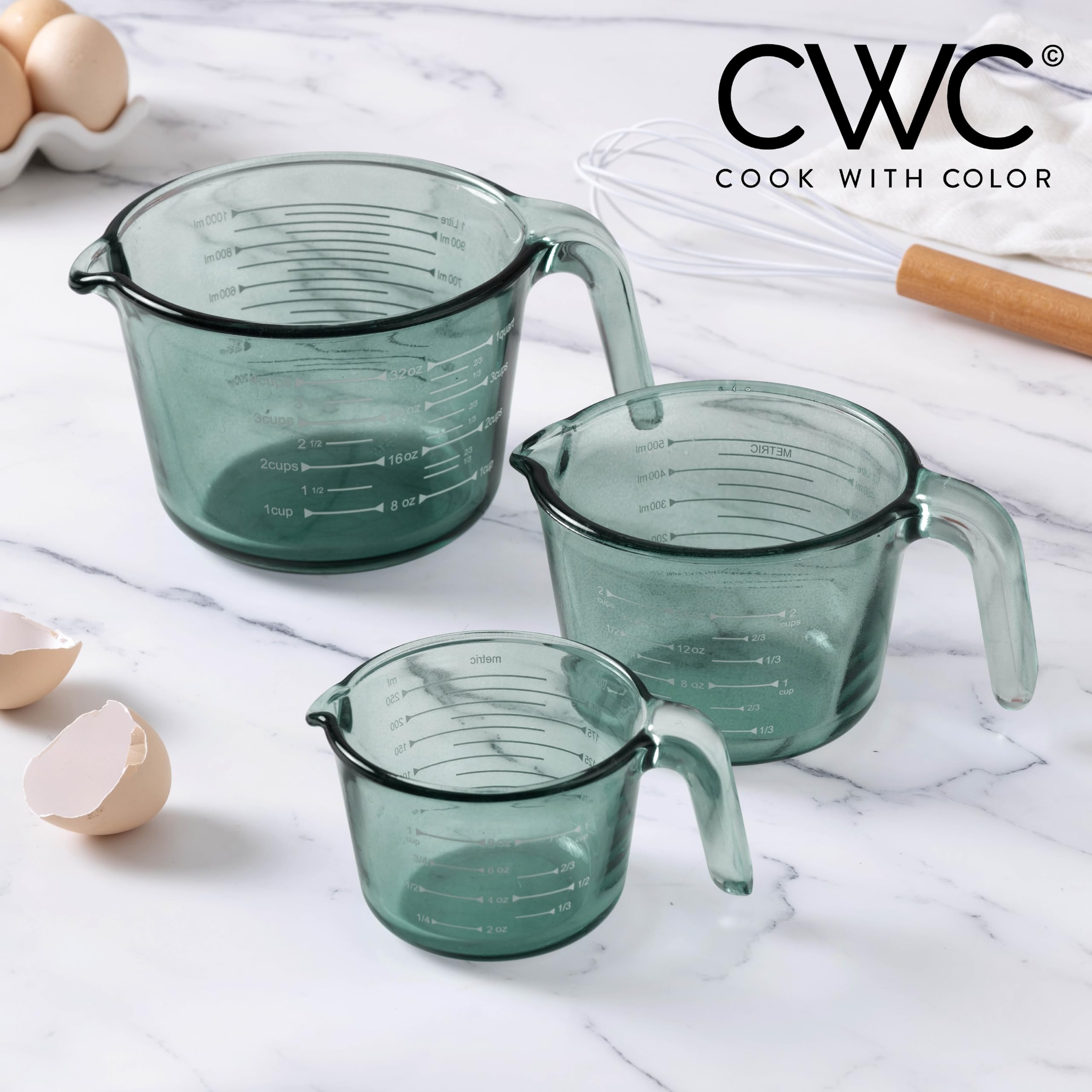 COOK WITH COLOR microwave-safe glass measuring cups for heating ingredients in the cup.