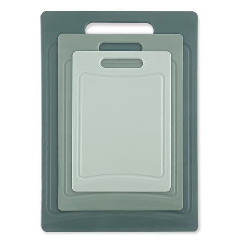 COOK WITH COLOR mint cutting board set hangs neatly for dry storage.