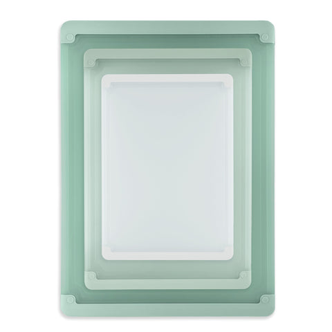 Cook with Color rubber-bordered boards provide grip for precise slicing