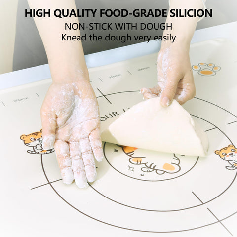 COOKSTYLE measuring silicone mat features millimeter scales for precise dough cutting.