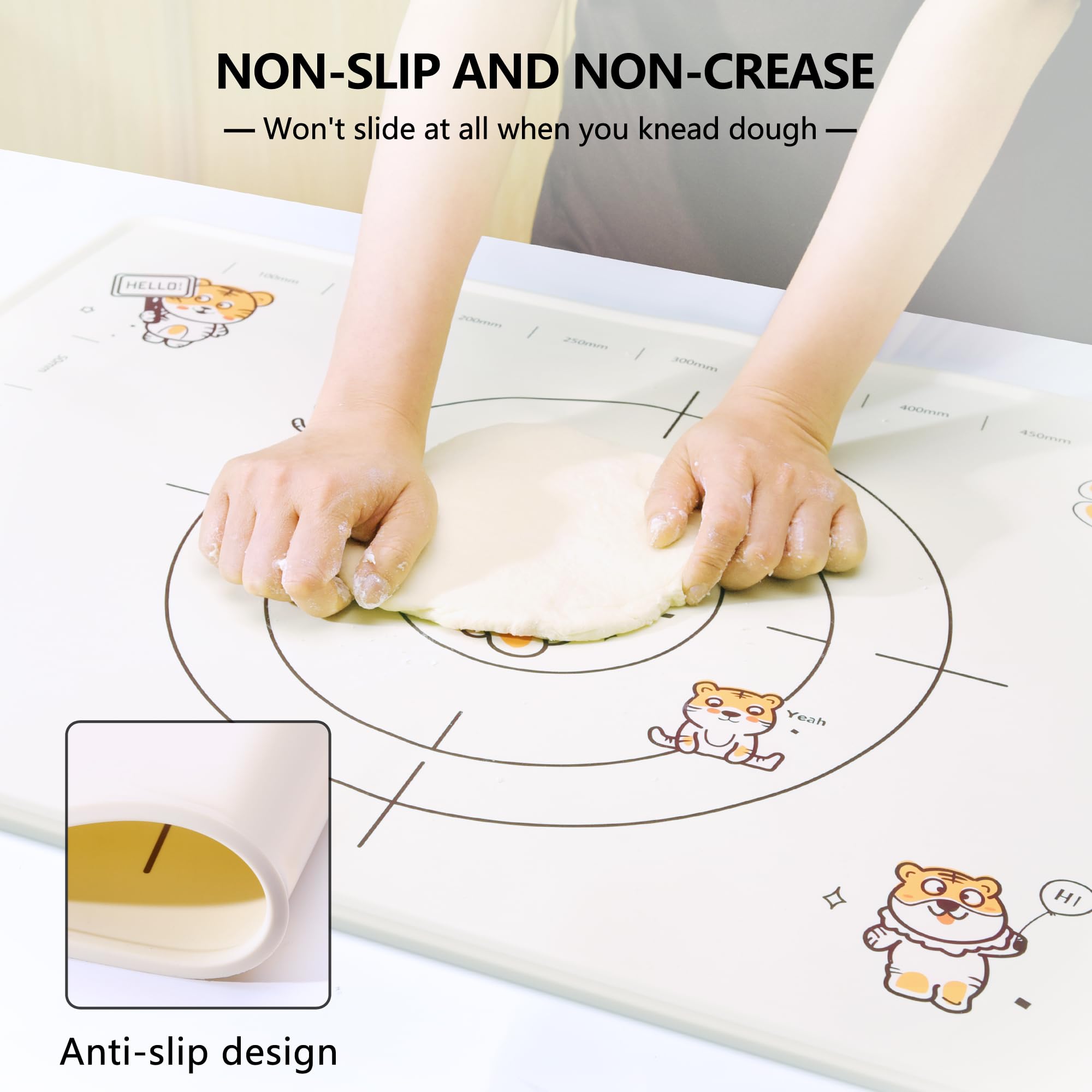 COOKSTYLE raised-edge silicone mat keeps liquids contained while kneading and mixing.