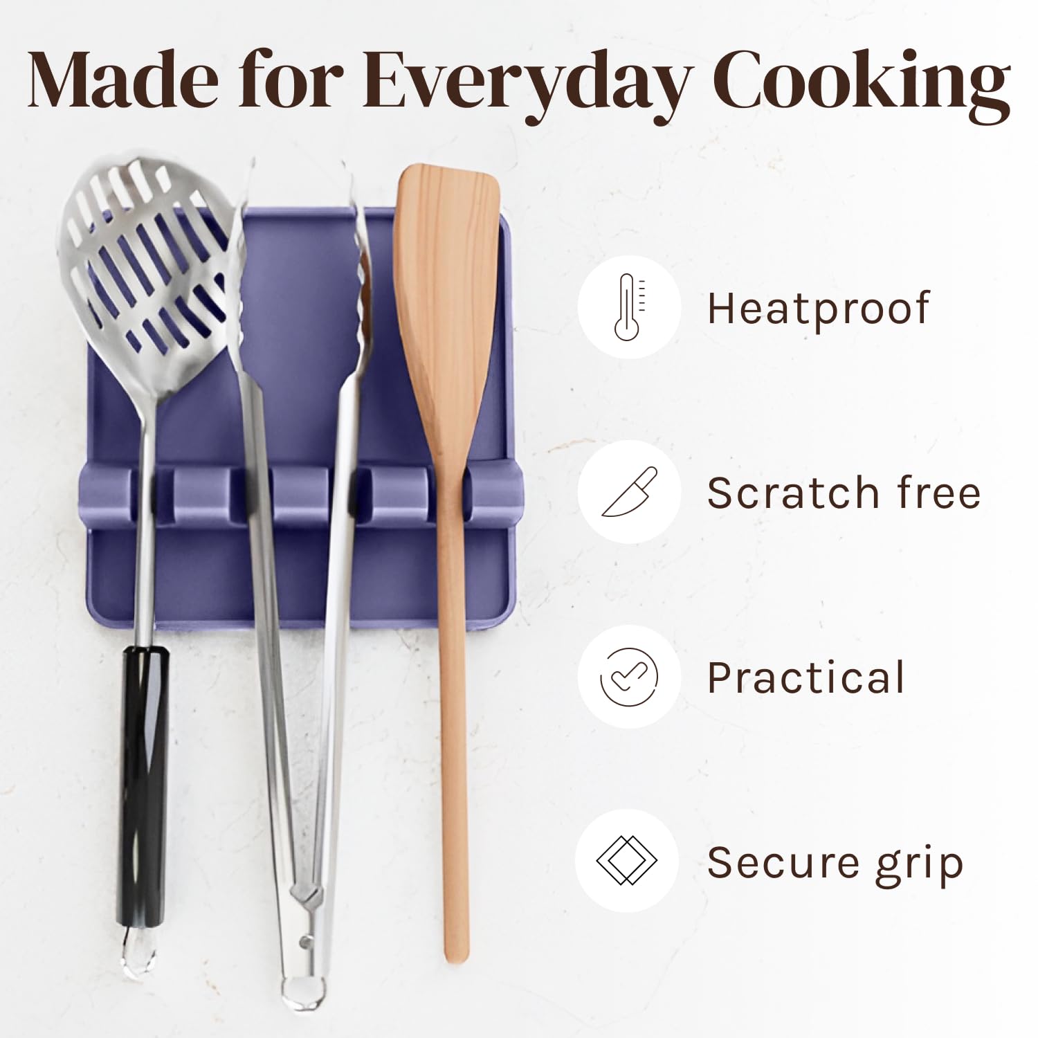 Raised edges prevent spills on Cooler Kitchen spoon rest