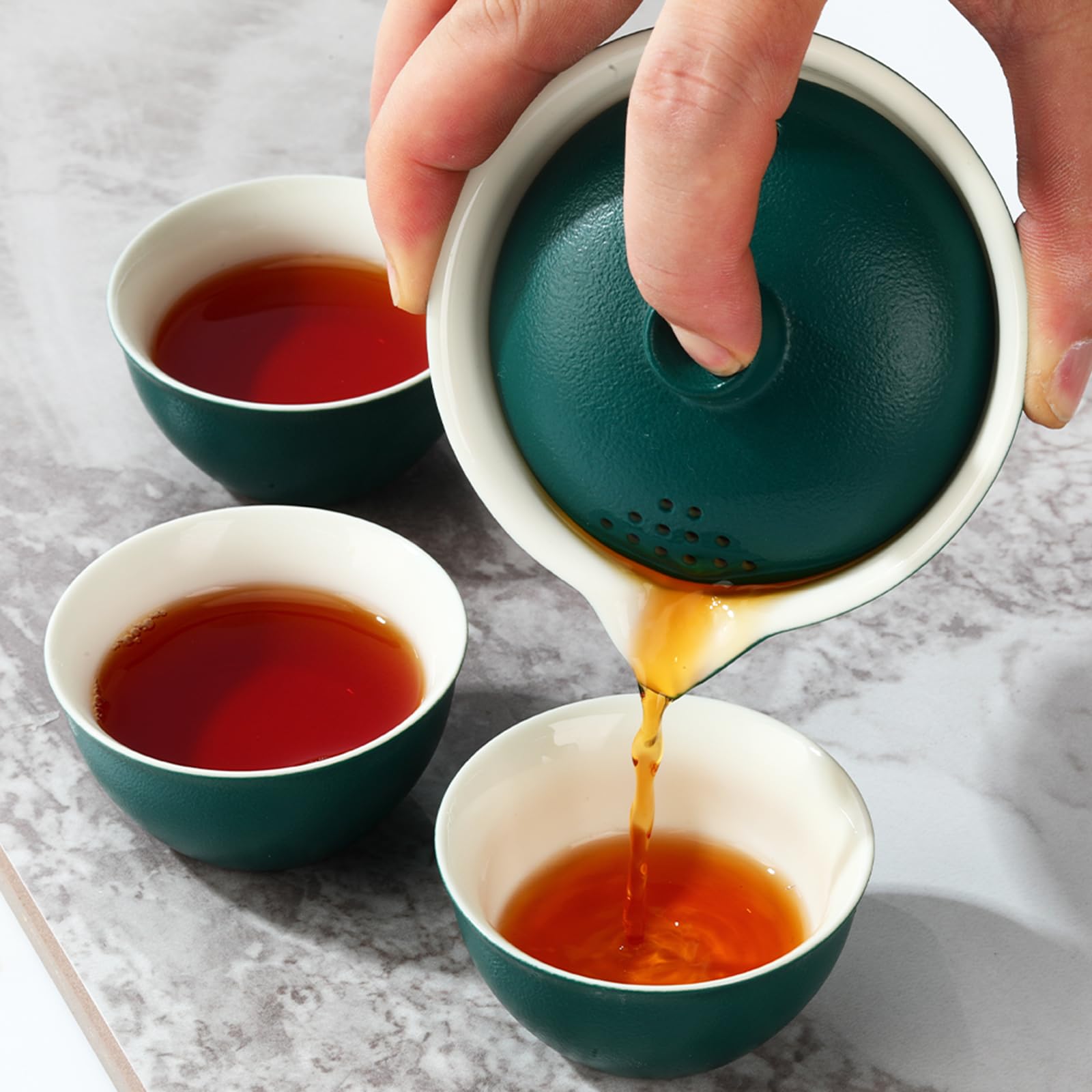 Coolpei eagle-mouth gaiwan with built-in filter for clear pours.