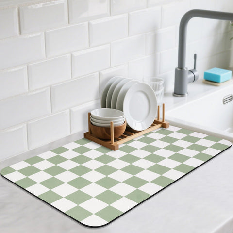 CooRug checkered dish drying mat 16x24 on a green counter, absorbent and practical.