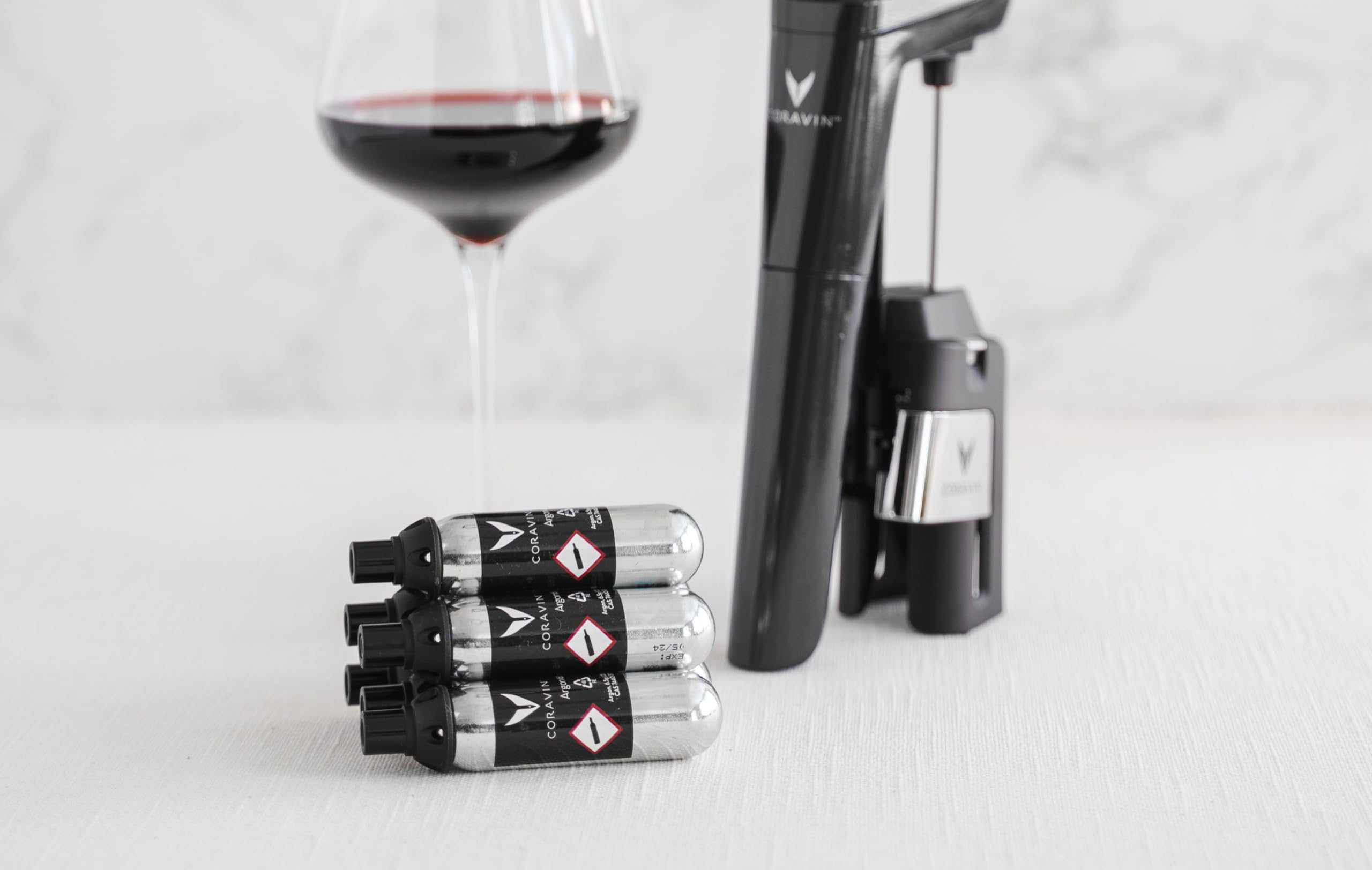 Close-up of CORAVIN Argon Capsules highlighting pure gas for smooth pour