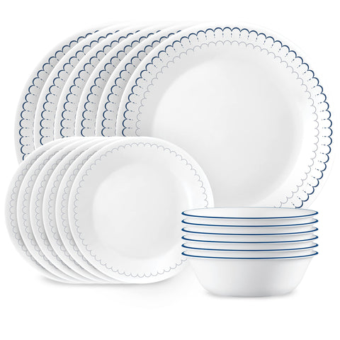 Corelle Caspian dinner plates with white surface and navy trim, ideal for daily meals.