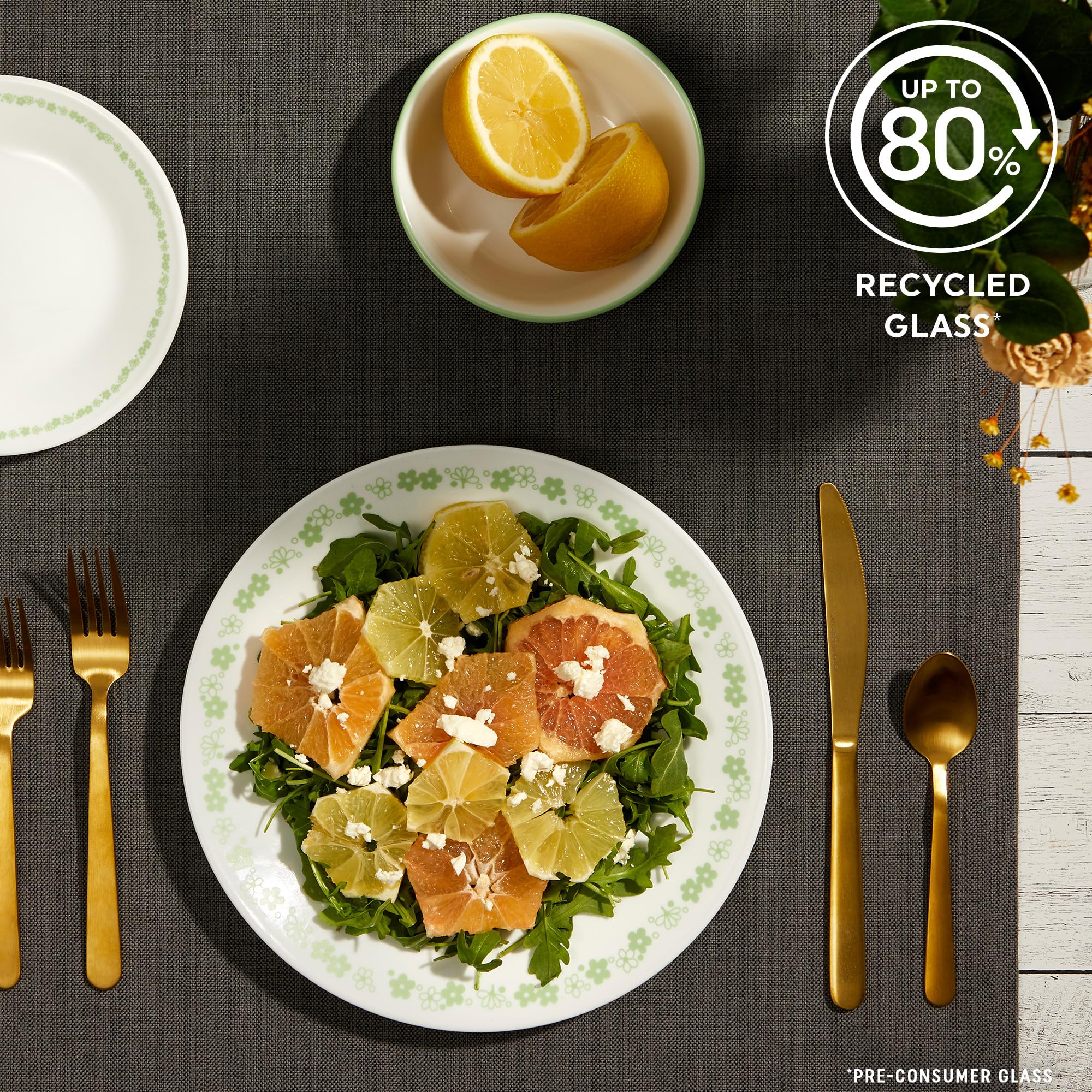 Corelle dining set displayed on a table showing coordinated, easy-care dinnerware for six.