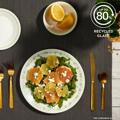 Corelle dining set displayed on a table showing coordinated, easy-care dinnerware for six.