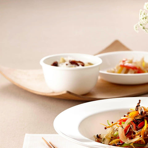 Corelle Vitrelle triple-layer-strong glass resists chips and cracks.