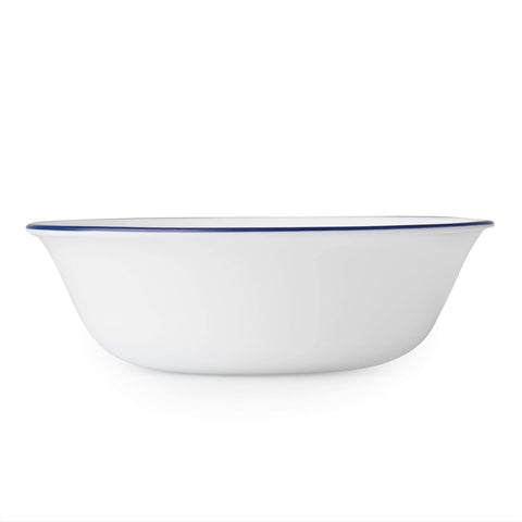 Close-up of Corelle Vitrelle Indigo Speckle bowls with blue rims.