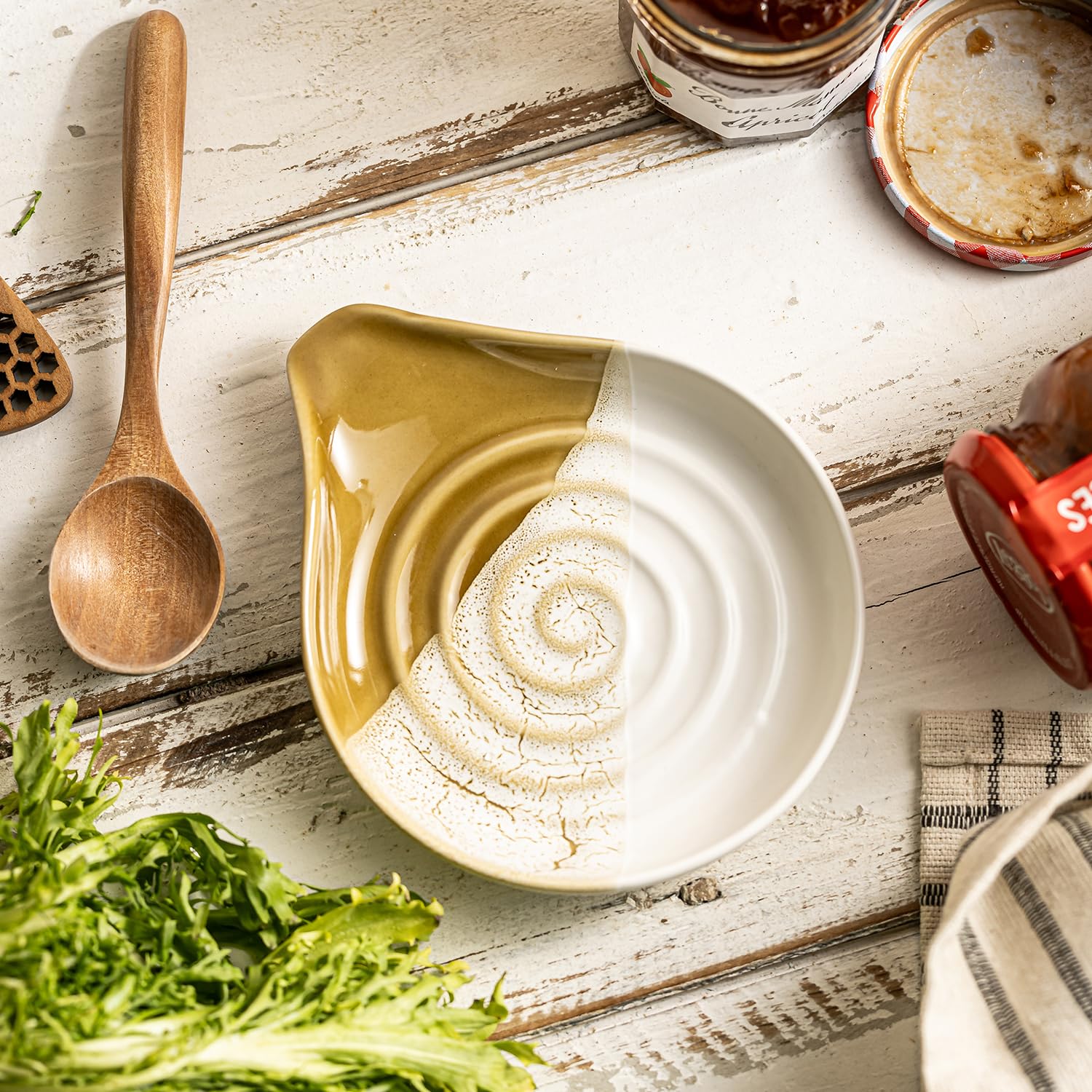 Cormomu ceramic spoon rest on countertop design adds sleek decor while catching drips.