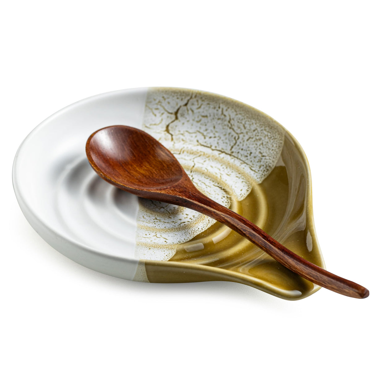 Cormomu ceramic spoon rest on stovetop keeps utensils organized and counters clean.