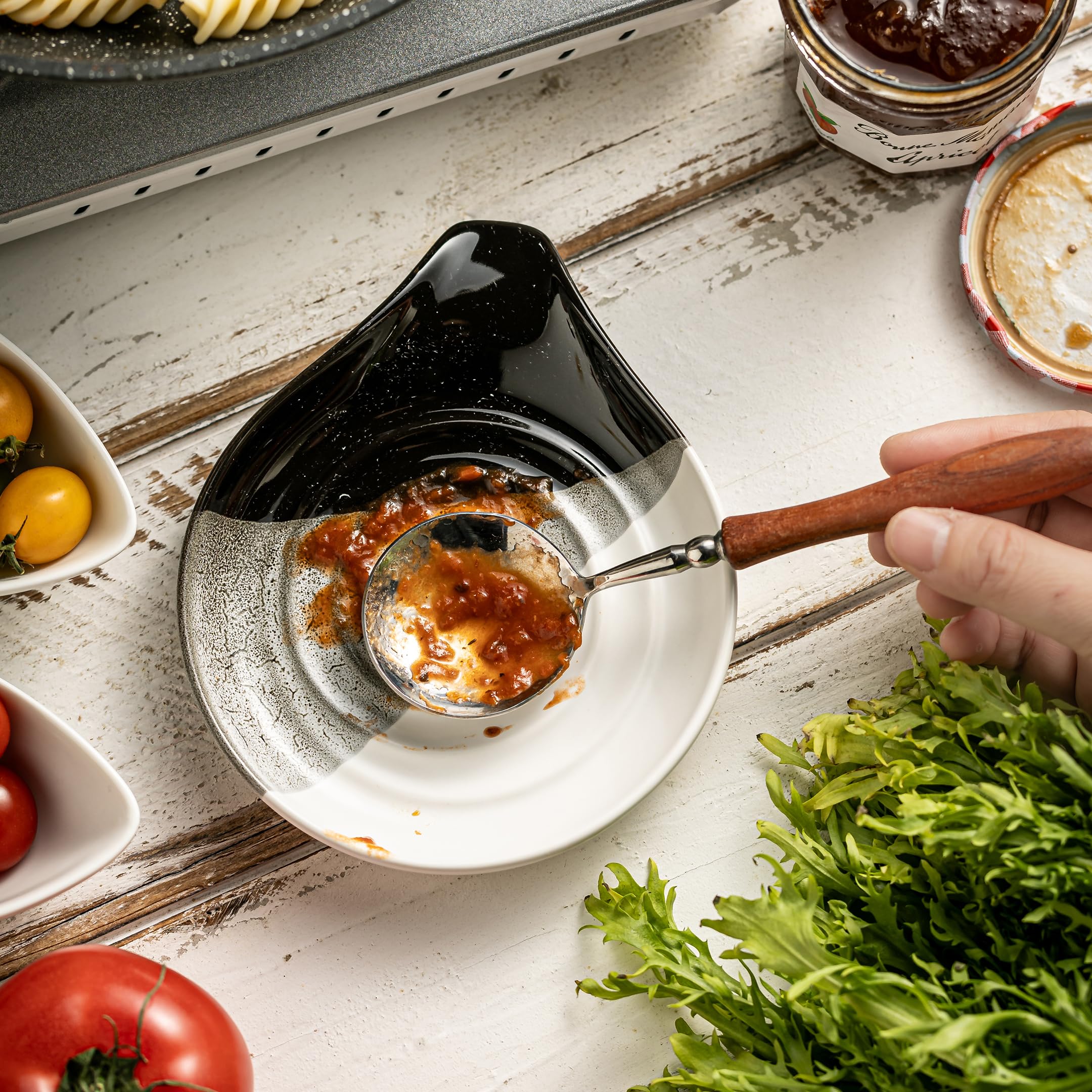 Cormomu reactive glaze spoon rest complements modern kitchen decor.