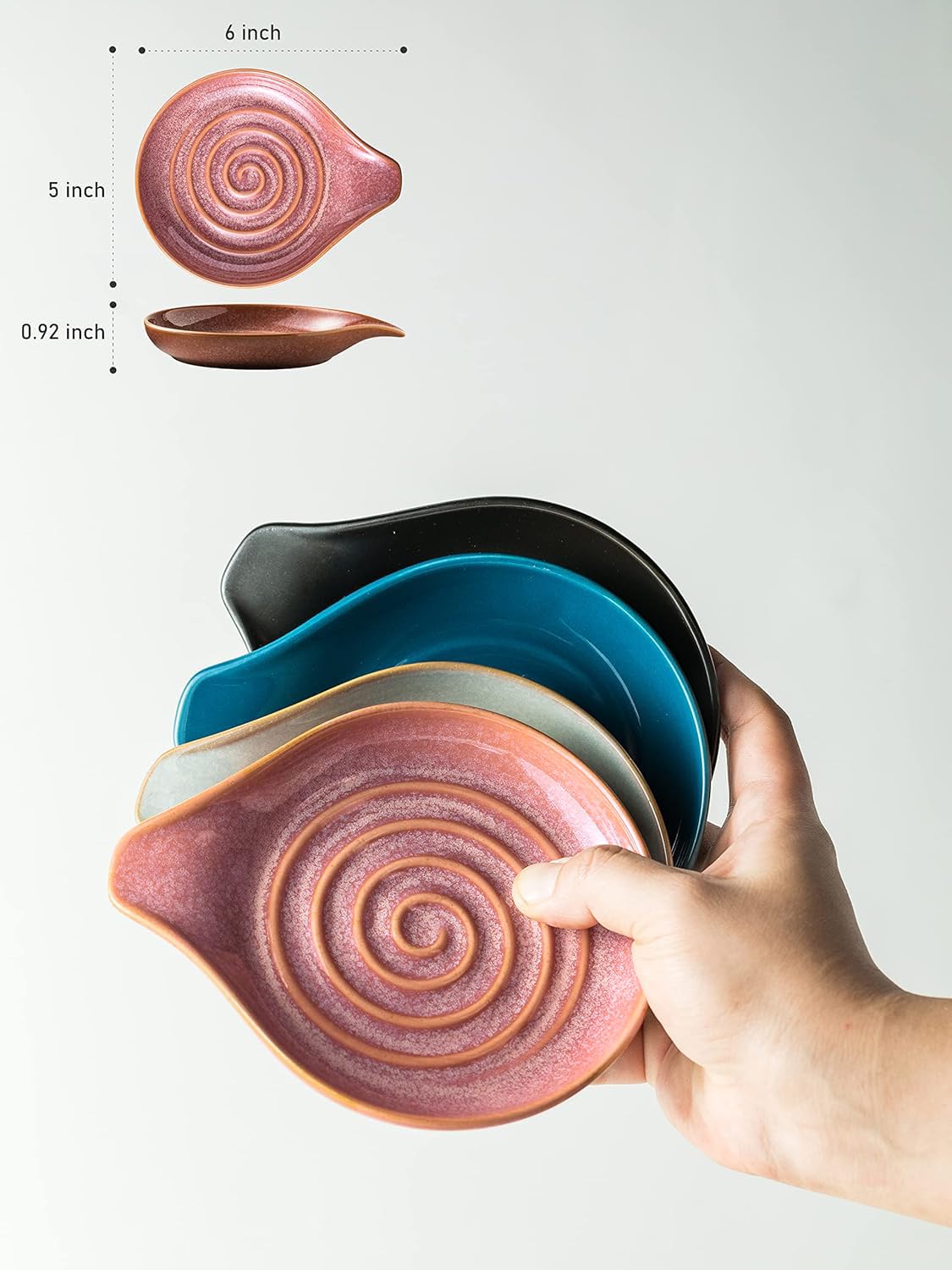 Cormomu spoon rest with centered depression catching drips from utensils.