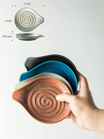 Heavy, stable ceramic prevents sliding; ideal for resting large spatulas over the stove.