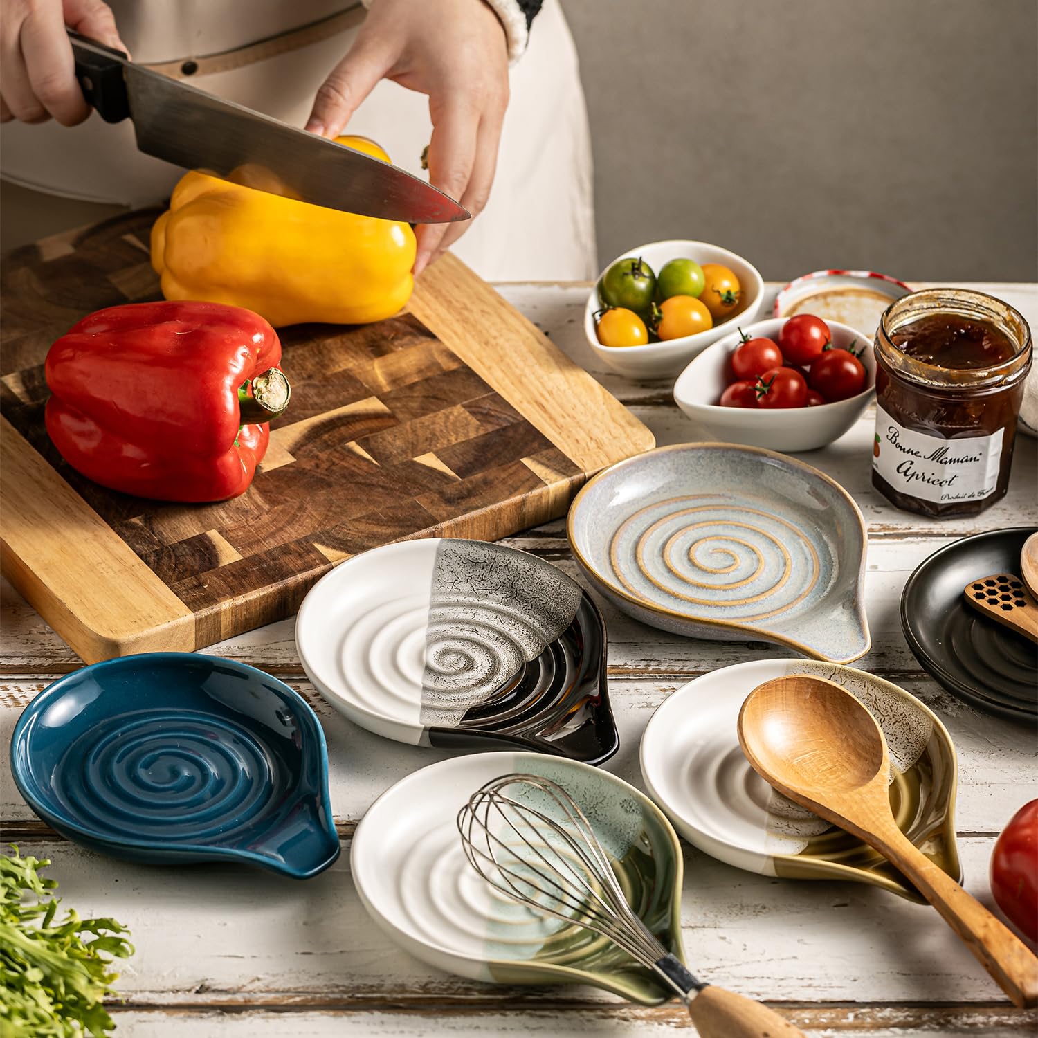 Reactive glaze and gray finish complement modern kitchen décor.