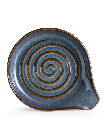 Cormomu stove top utensil rest with wide base keeps spoons secure.