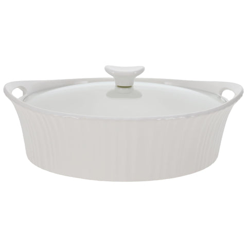 CorningWare French White oval casserole with glass lid, ideal for oven-to-table use.