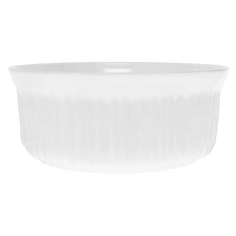 CorningWare FS1 dish in use on table, oven-safe and dishwasher-safe for easy cleanup.