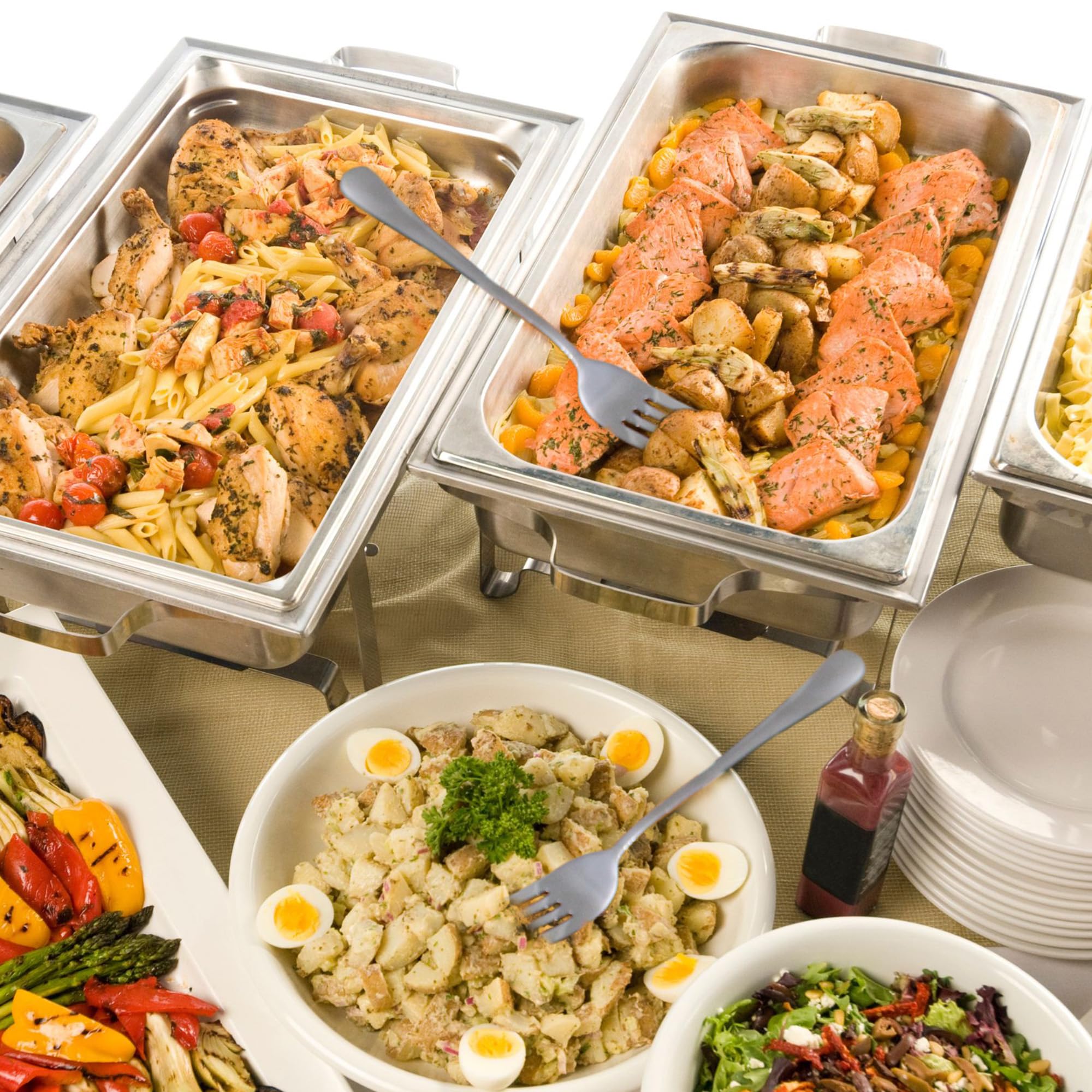 Cornucopia Brands essential kitchen serving fork pairing with spoons.