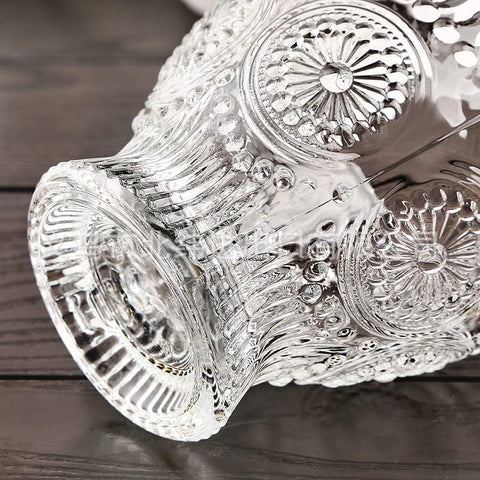 Cosnou glass cups keep beverages hot or cold with decorative flair.