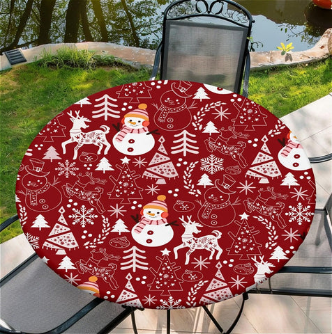 COTAIL round tablecloth on a 60-inch table demonstrates secure elastic fit.
