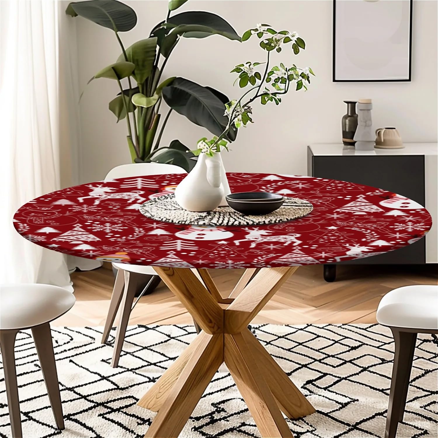 COTAIL round tablecloth with festive Christmas pattern adds holiday charm.