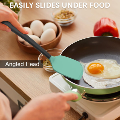 Coukre solid spatula designed for stirring and scraping.
