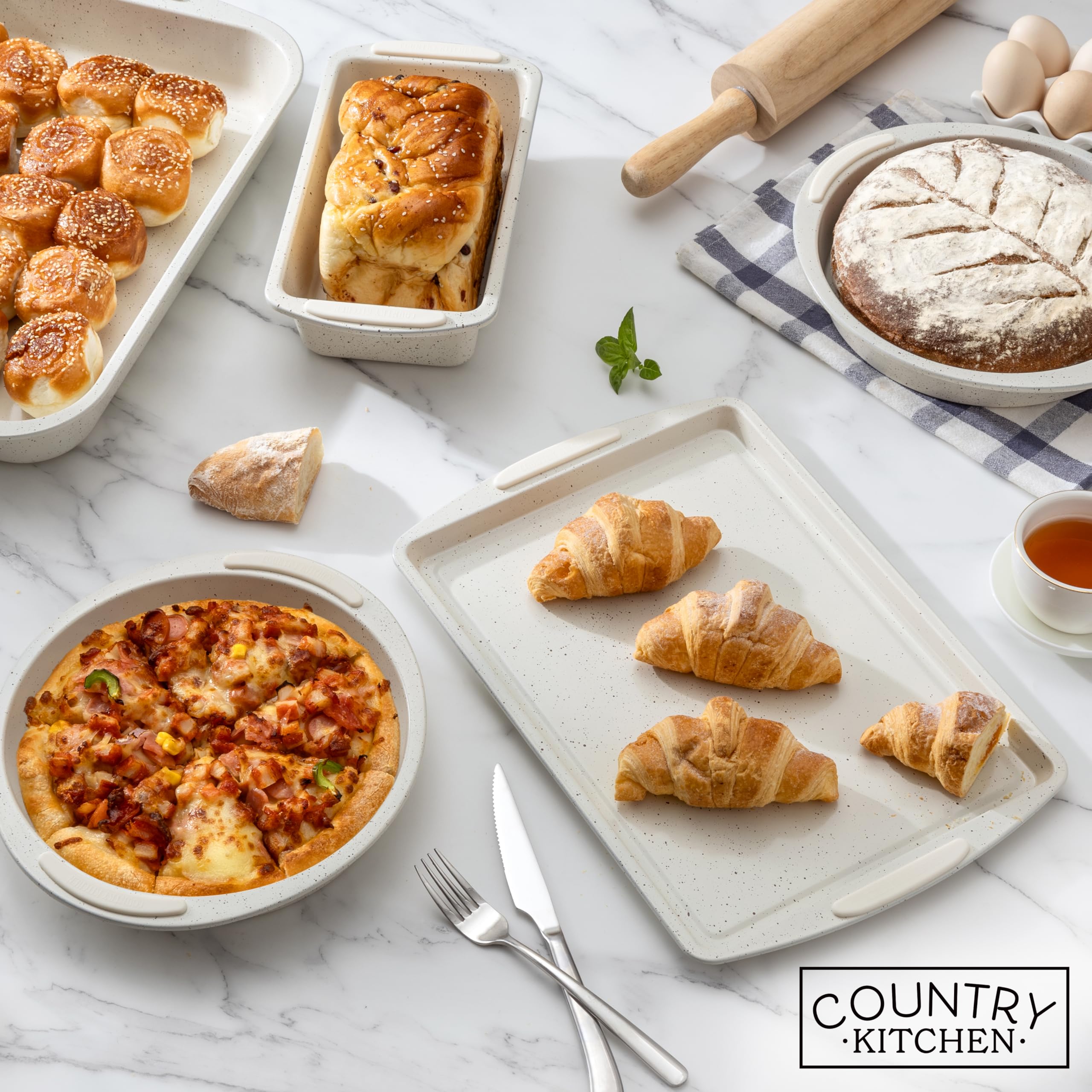 Country Kitchen bakeware with easy release in cream simplifies cleanup after baking.