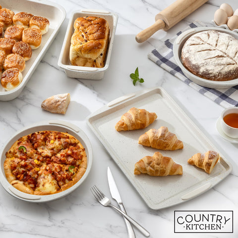 Country Kitchen bakeware with easy release in cream simplifies cleanup after baking.