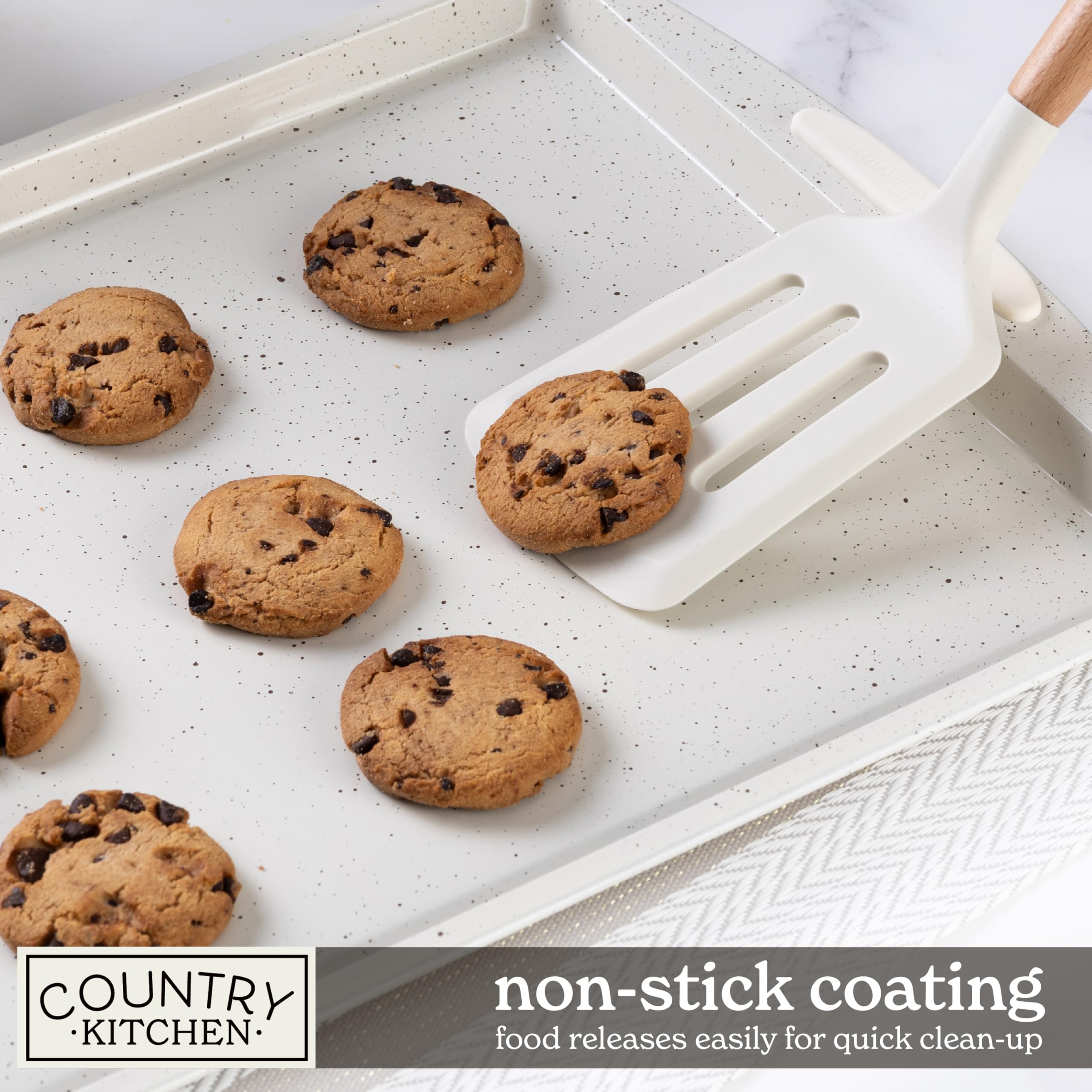 Country Kitchen nesting bakeware set in cream saves space when not in use.