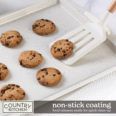 Country Kitchen nesting bakeware set in cream saves space when not in use.