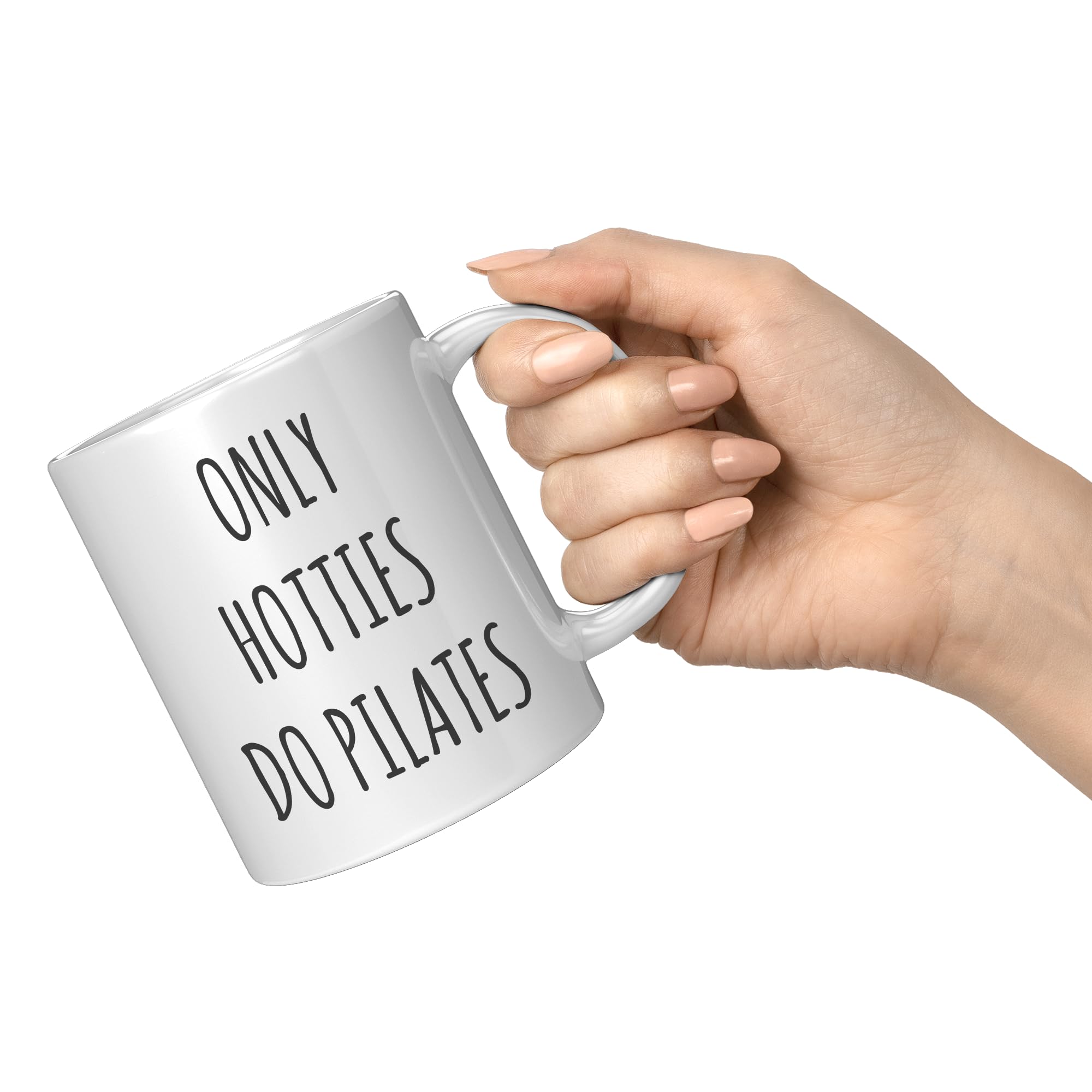 Coveted Goods Pilates Mug in hand, comfortable handle for hot drinks.