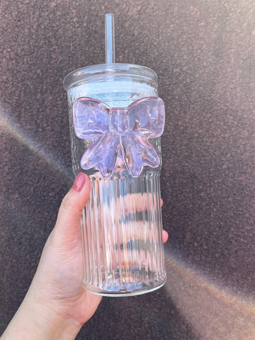 Clear glass tumbler for smoothies, iced coffee, or cocktails with straw.
