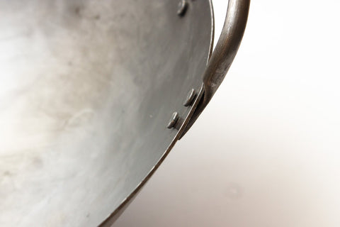 Craft Wok Big 16-Inch Hand-Hammered Surface highlights craftsmanship and even heat distribution
