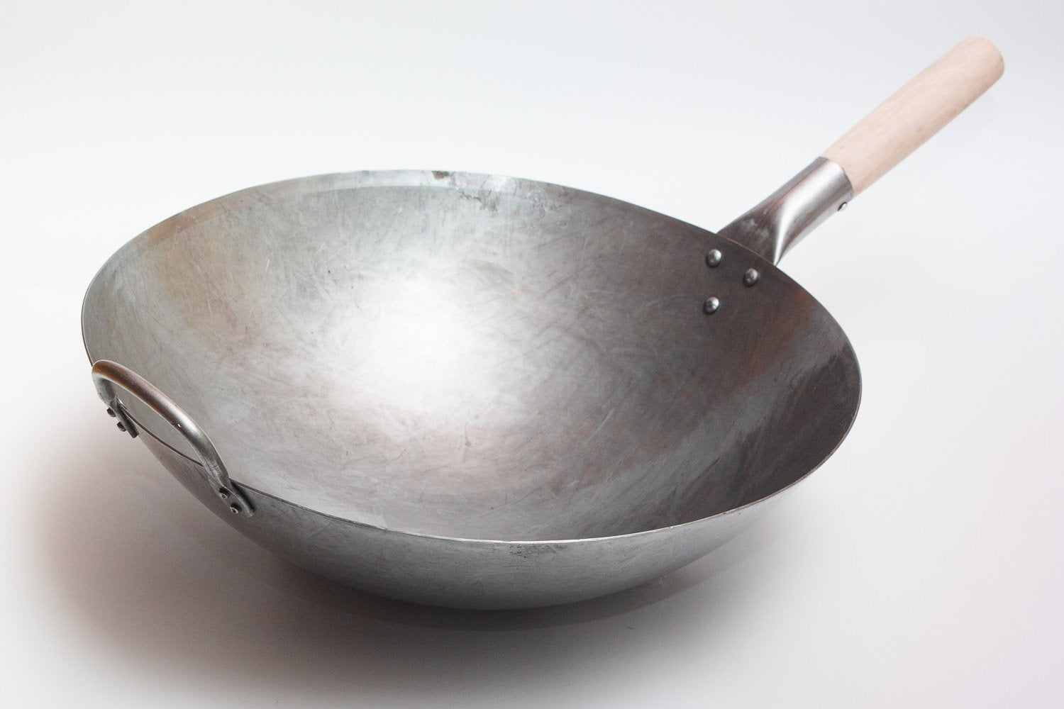 Craft Wok dual-handles design supporting balanced control during cooking.