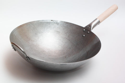 Craft Wok dual-handles design supporting balanced control during cooking.
