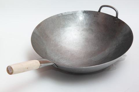 Craft Wok high-heat stir-fry action shot highlighting wok performance.