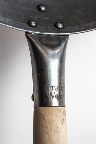 Craft Wok round-bottom pan design detail for authentic wok cooking.