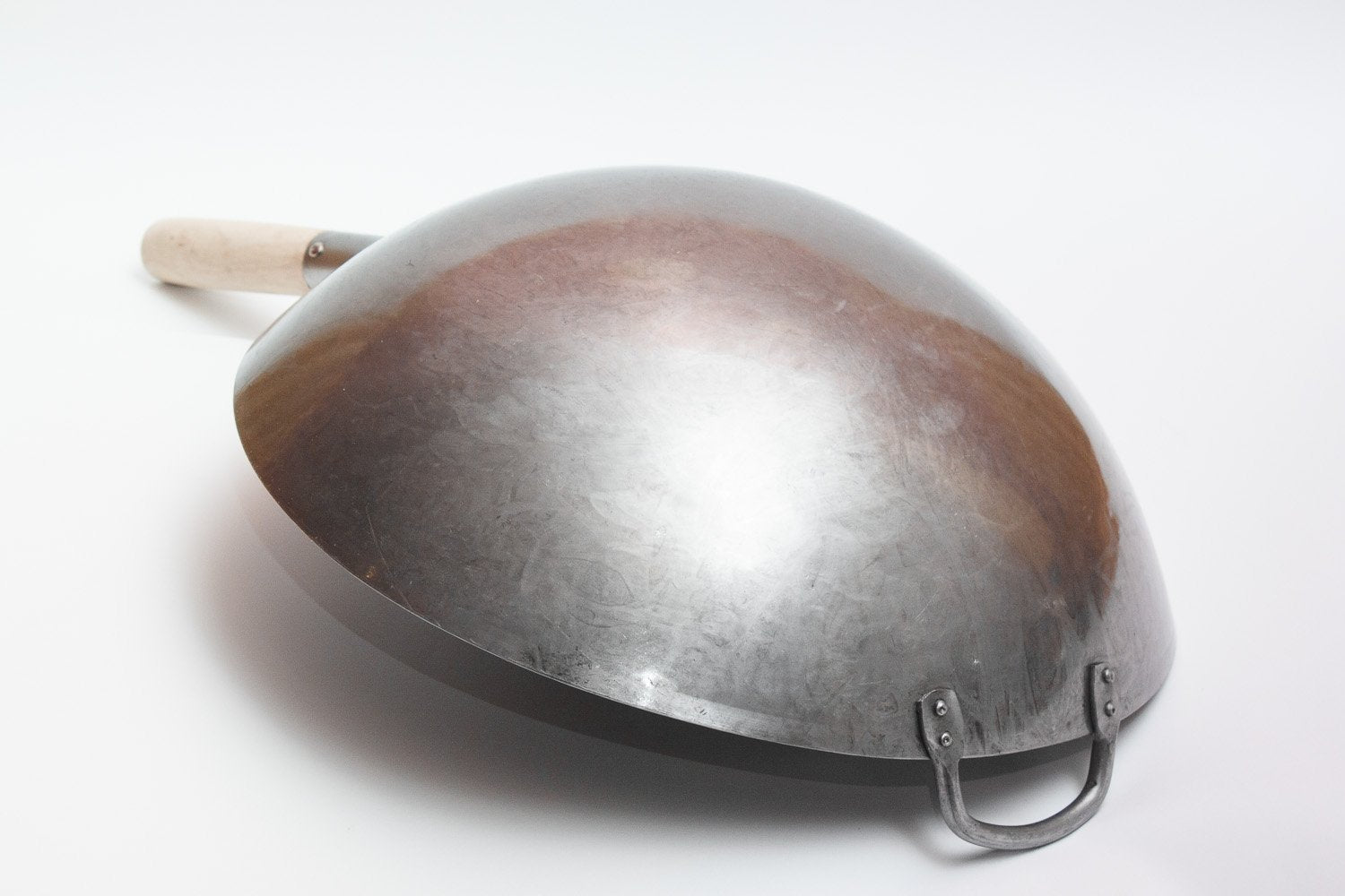 Craft Wok wooden handle with steel helper handle shown for comfortable stir-frying.