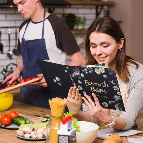 CraftSaints 3-ring binder with dividers and protectors for organized recipe storage.