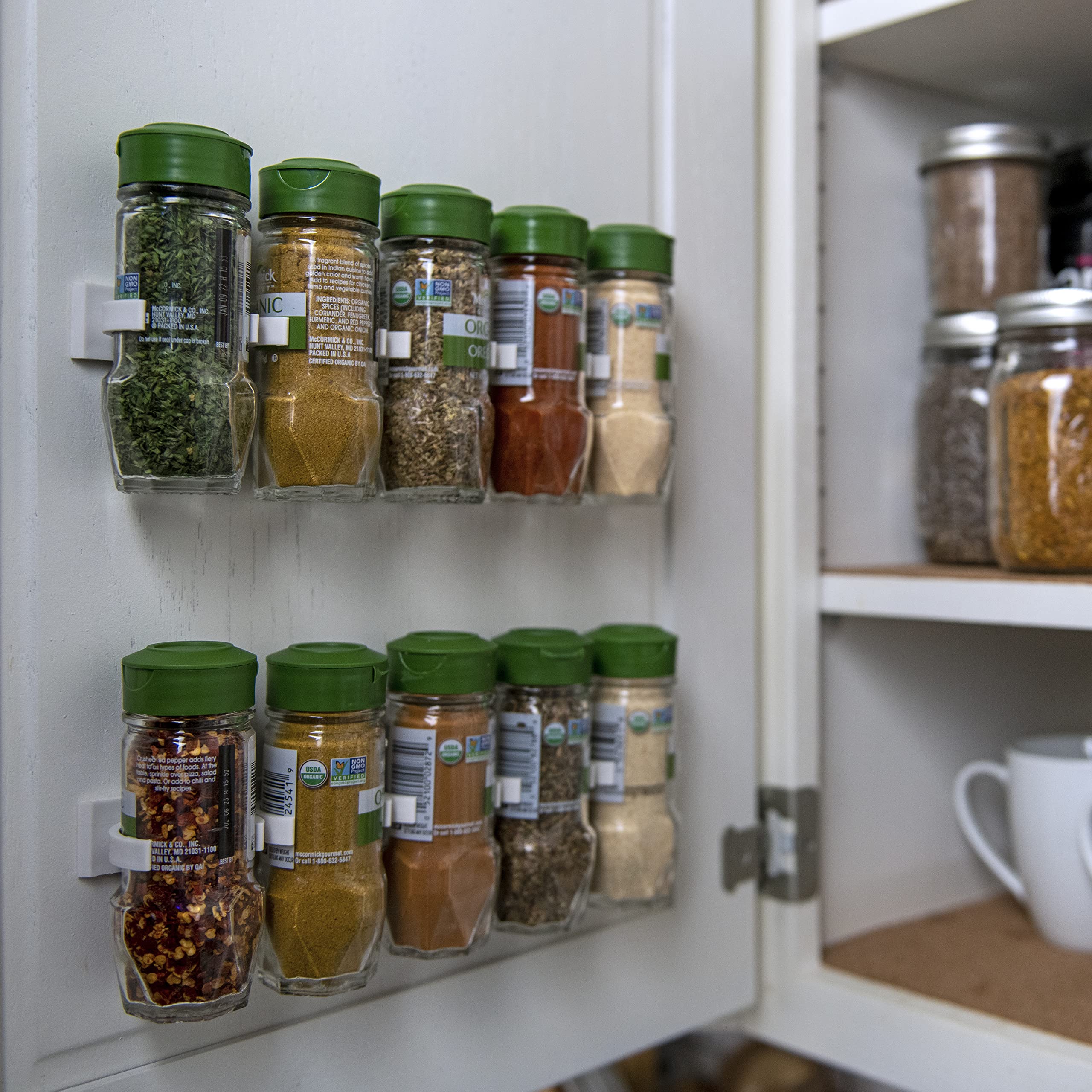 Crazy Chef Spice Clips attached to RV cabinet for secure travel storage