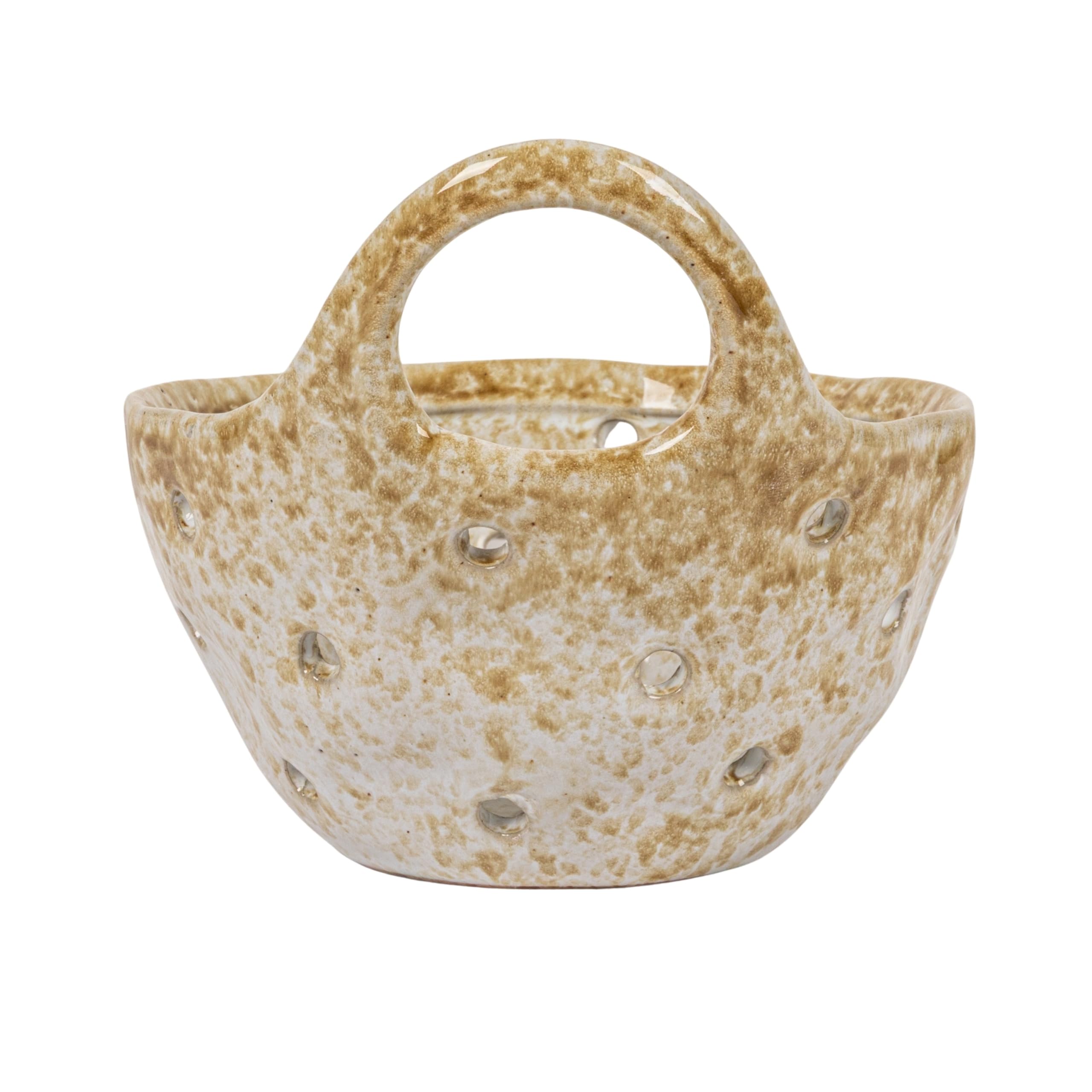 Creative Co-Op handle detail on beige stoneware colander