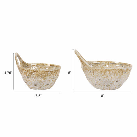 Creative Co-Op small beige stoneware colander with handle for quick rinsing