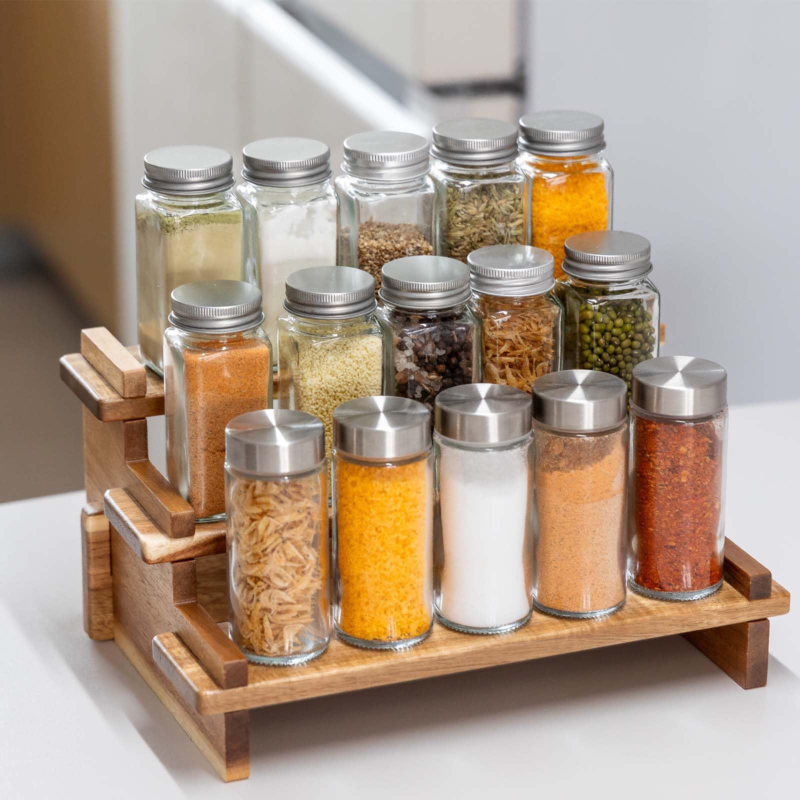 CROWNWOW acacia rack fits inside cabinets for compact, organized storage.